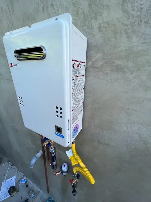 Tankless water heater installation for Breakers Row homes